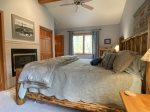 2nd bedroom features king log bed